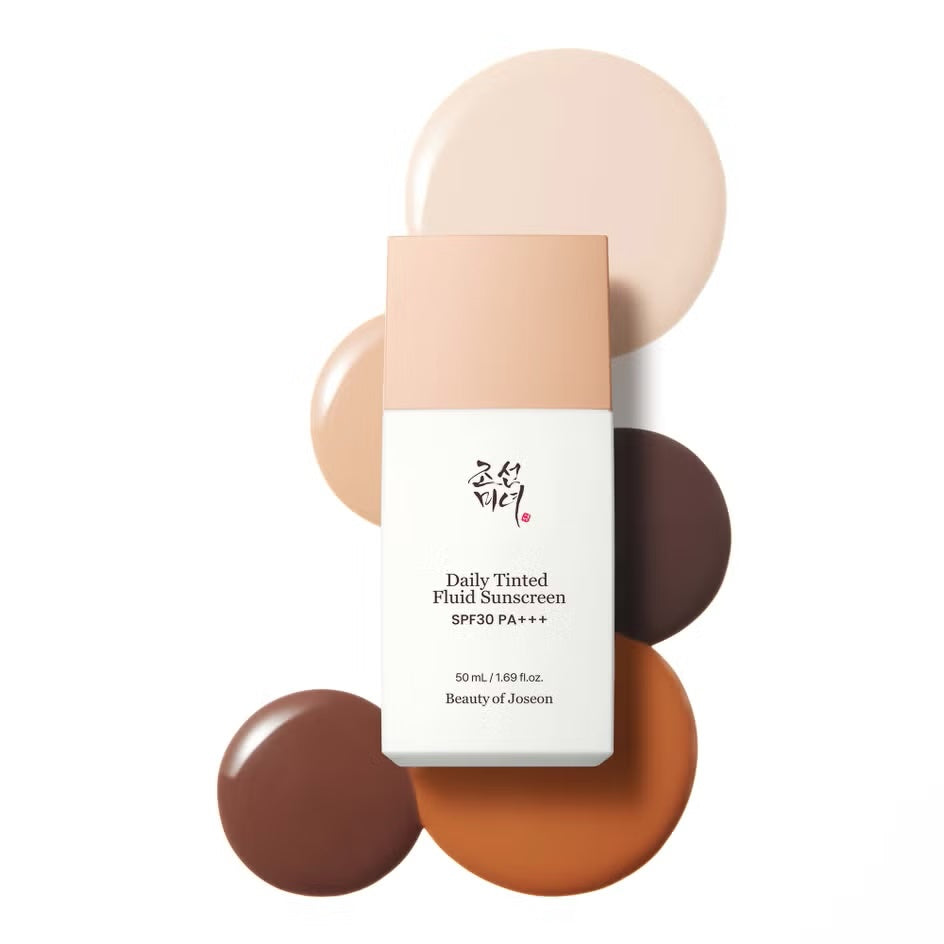 Beauty of Joseon Daily Tinted Fluid Sunscreen SPF 30 PA+++ in a white rectangular bottle with a peach-colored cap, styled on a white background with circular swatches of light peach, beige, brown, and terracotta.