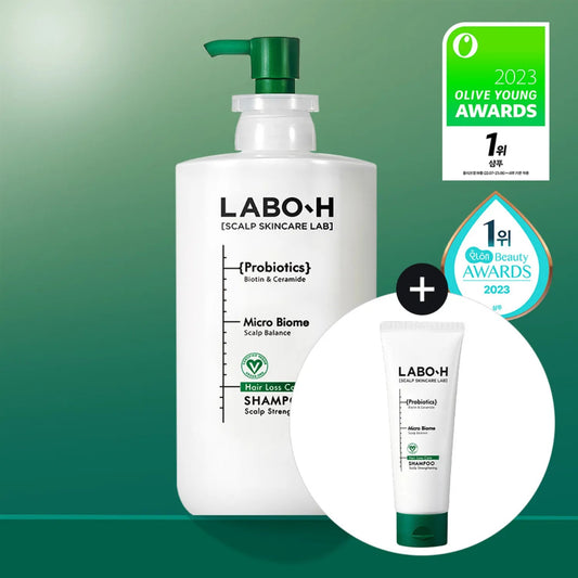 LABO-H shampoo bottle with a smaller tube on a green gradient background, featuring awards.