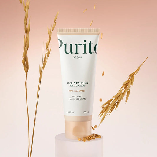 Purito oat cream tube with dried oats on a pink background