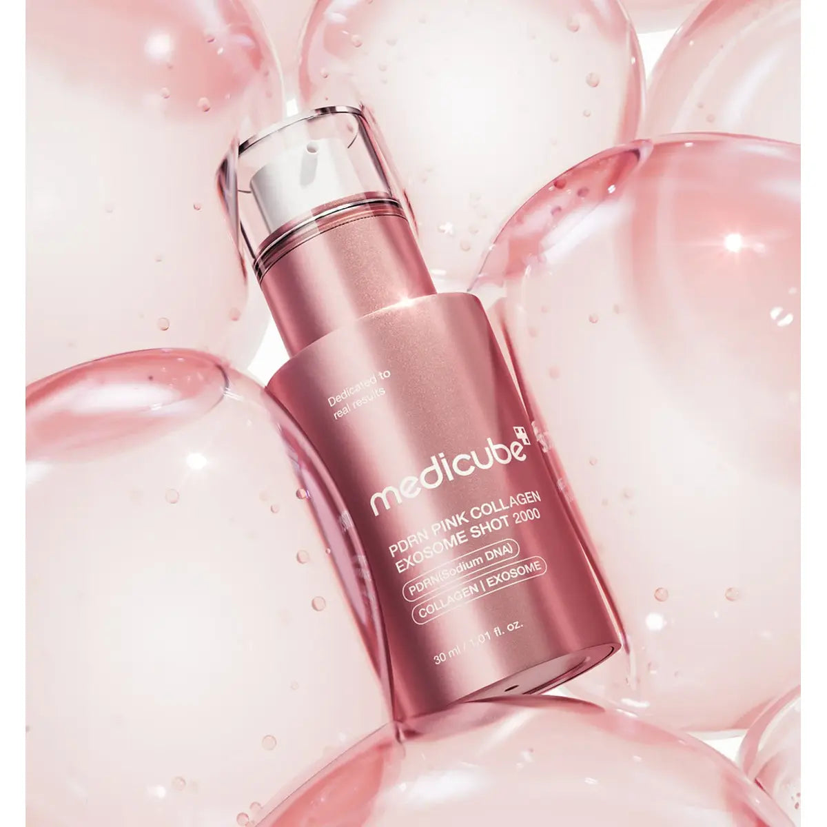 Medicube PDRN Pink Collagen Exosome Shot 2000 30ml bottle surrounded by pink bubbles in Pakistan