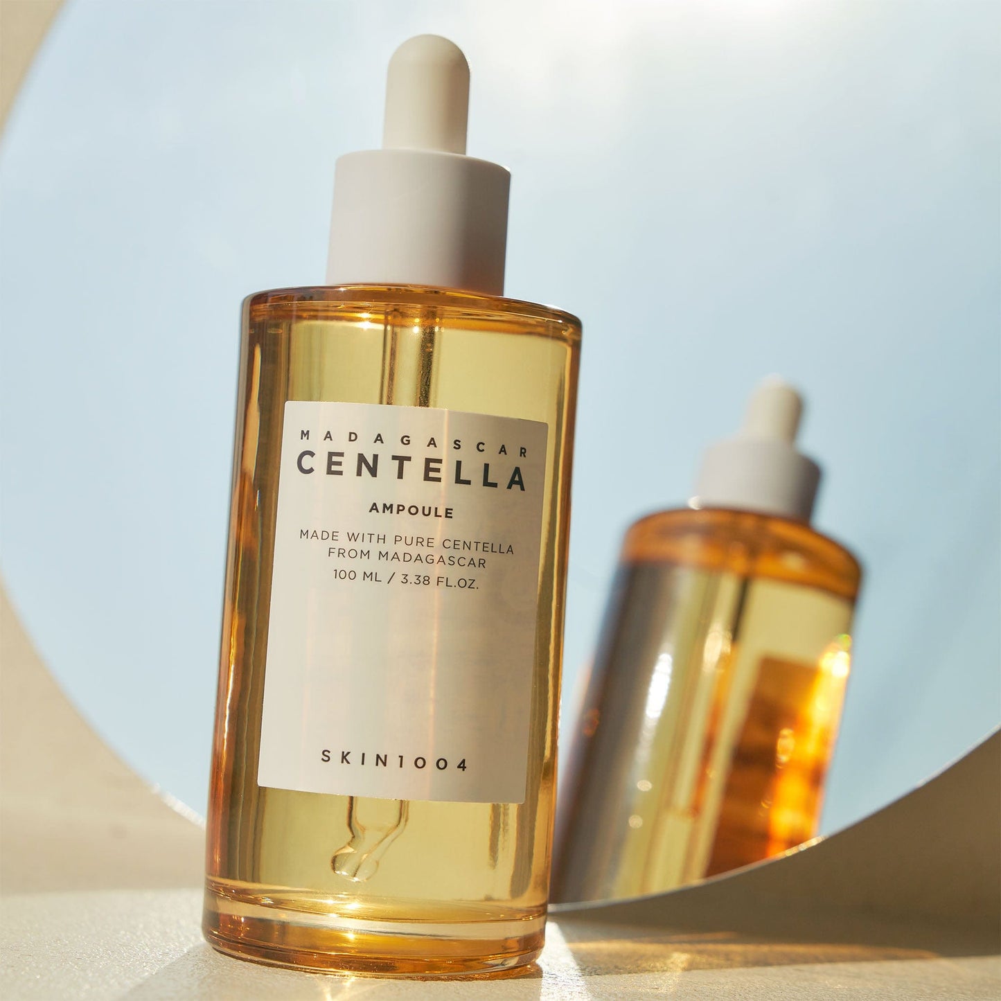 Image of Skin1004 Madagascar Centella Ampoule 55ml from Kocometic PK, featuring a hydrating and calming formula with Madagascan Centella Asiatica extract, perfect for soothing sensitive and acne-prone skin.